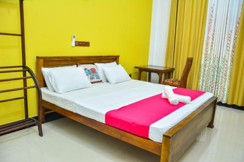 Кровать или кровати в номере Ocean Bliss Villa Mirissa