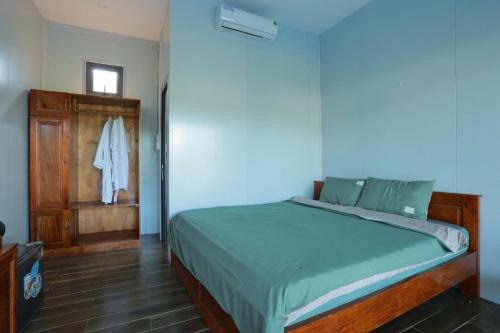 Postel nebo postele na pokoji v ubytování BiXu House