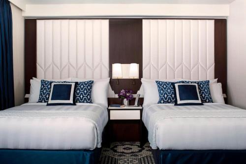 Un ou plusieurs lits dans un hébergement de l'établissement Residence Inn by Marriott New York Manhattan/Central Park