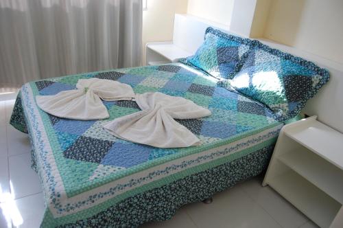 Postel nebo postele na pokoji v ubytování Santorini Hotel