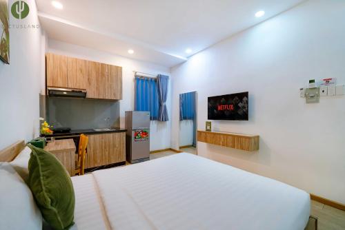 Cuisine ou kitchenette dans l'établissement Cactusland Hotel & Apartment