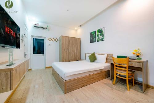 Un ou plusieurs lits dans un hébergement de l'établissement Cactusland Hotel & Apartment