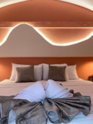 Postel nebo postele na pokoji v ubytování Almabella Hotel