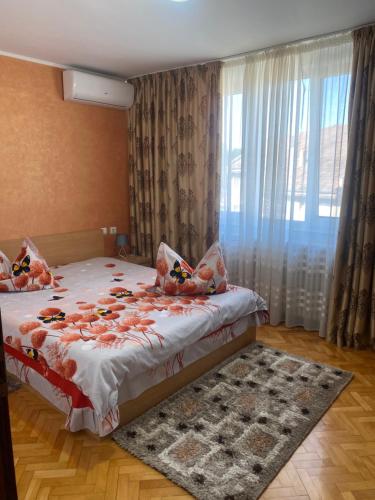 Ένα ή περισσότερα κρεβάτια σε δωμάτιο στο Apartament Lena