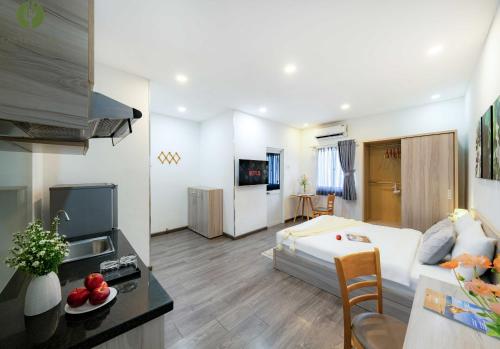 Télévision ou salle de divertissement dans l'établissement Cactusland Hotel & Apartment