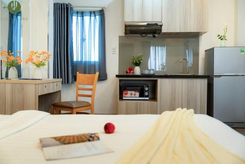 Cuisine ou kitchenette dans l'établissement Cactusland Hotel & Apartment