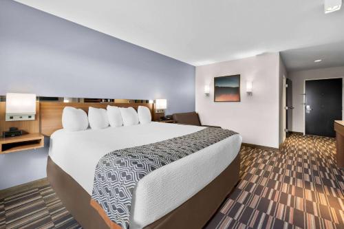 Postel nebo postele na pokoji v ubytování Microtel Inn & Suites by Wyndham Sweetwater