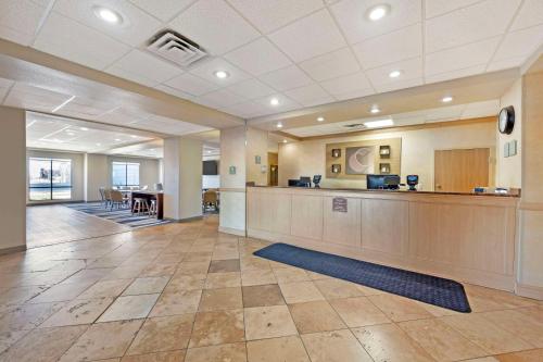 an office lobby with a waiting area and a desk at Comfort Inn & Suites Rawlins in Rawlins
