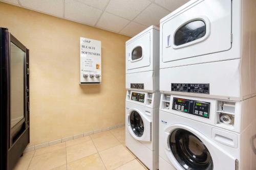 a laundry room with a washer and dryer at Comfort Inn & Suites Rawlins in Rawlins