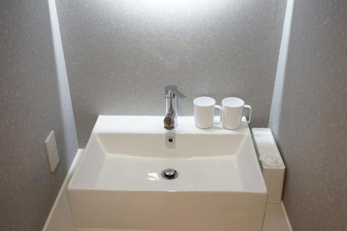 Ein Badezimmer in der Unterkunft Yukimi Hirafu
