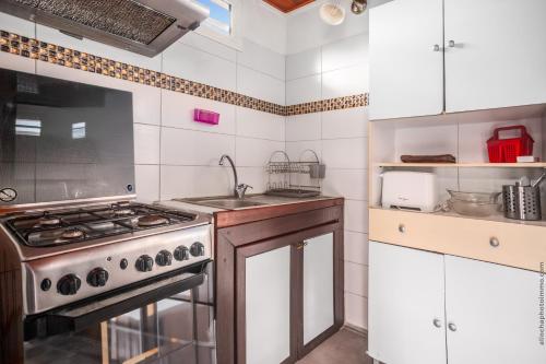 Kuchyň nebo kuchyňský kout v ubytování Horizon Créole - Climatisé avec piscine partagée