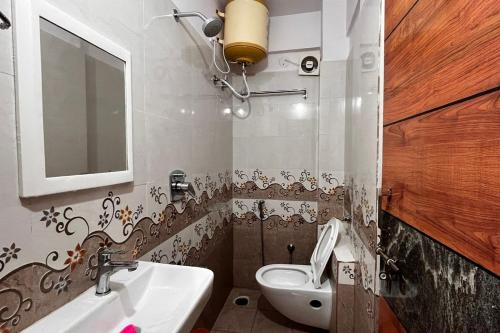 Ένα μπάνιο στο Krishna Stay Inn