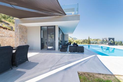 an image of a house with a swimming pool at Zenvillas in Lefkada Town