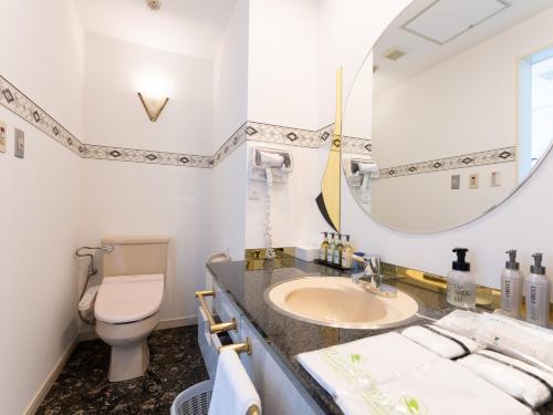 Ein Badezimmer in der Unterkunft Tabist Shizukuishi Resort Hotel
