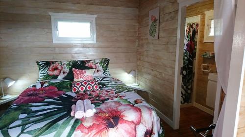 Voodi või voodid majutusasutuse Red Hibiscus Villas toas
