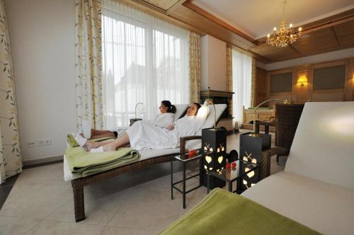 Postel nebo postele na pokoji v ubytování Wohlfühlhotel Bercher