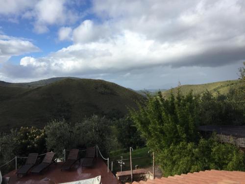 a view of the mountains from the roof of a house at I Giardini Di Margius in Itri