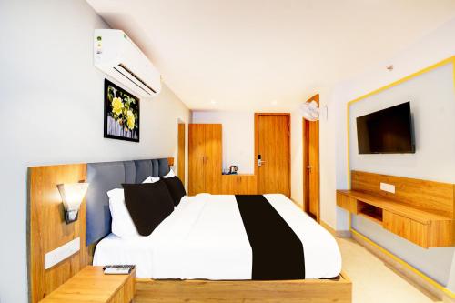 Townhouse Shobhagpura Formerly Fragrance Hotelにあるベッド