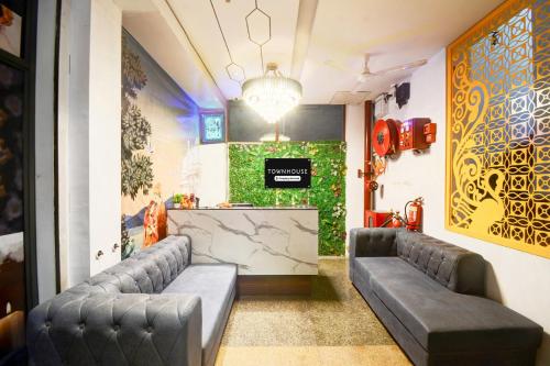 Townhouse Shobhagpura Formerly Fragrance Hotelにあるシーティングエリア
