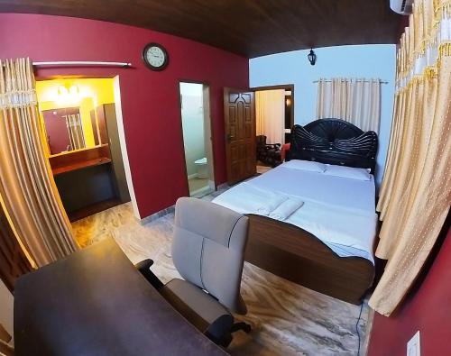 Postel nebo postele na pokoji v ubytování Entire Villa Homestay Rooms IRITTY