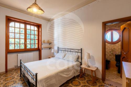 En eller flere senge i et værelse på Villa Lume - Piscina Privata - by Cala Salento