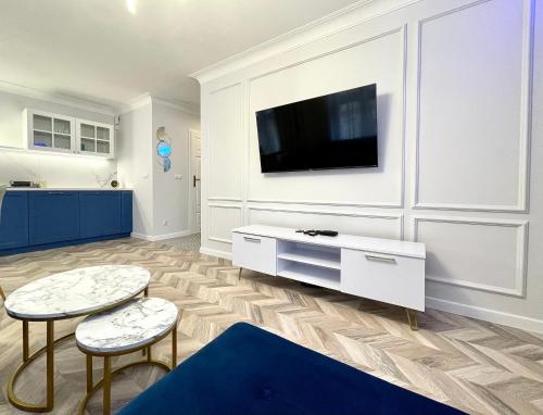 Μια τηλεόραση ή/και κέντρο ψυχαγωγίας στο Central Old Town Apartments - Green Loft and BelleView