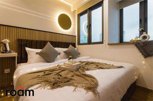 Ένα ή περισσότερα κρεβάτια σε δωμάτιο στο The Riv, Riveria City KL Sentral