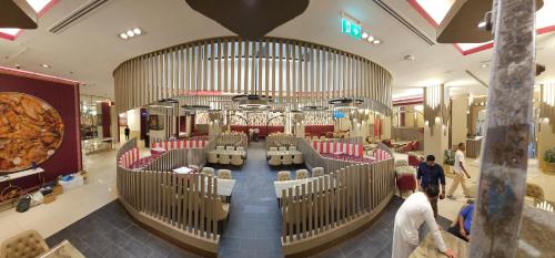 a view of a shopping mall with people walking around it at AlRaef Luxury Apartments in Dubai