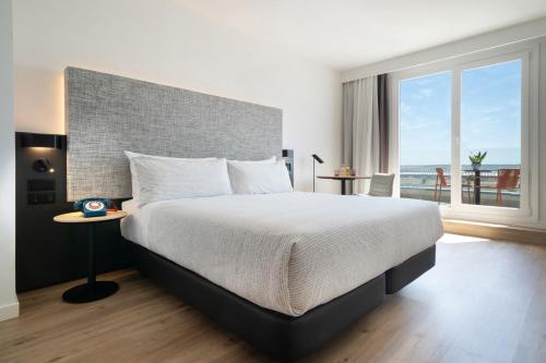 Un ou plusieurs lits dans un hébergement de l'établissement INNSiDE by Meliá Madrid Valdebebas