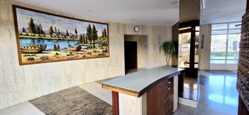 a room with a painting on the wall at Edificio Torpa in Benidorm