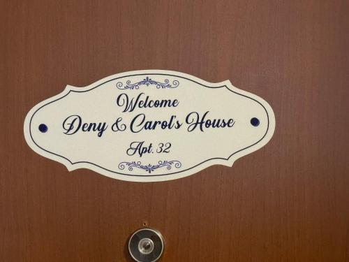 a sign on a door that reads welcome dawn and carvers house at Deny & Carol's house in Somma Lombardo