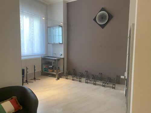a room with chairs lined up against a wall at SmArt Hotel Bartolini in Montecatini Terme