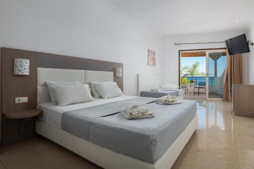 Katil atau katil-katil dalam bilik di Aquarius Beach Hotel