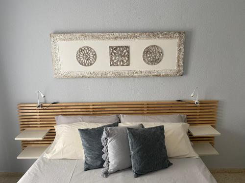 Un ou plusieurs lits dans un hébergement de l'établissement Apartamento en Casco Histórico