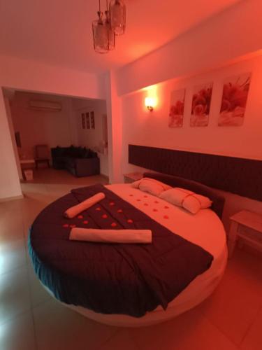 Una cama o camas en una habitación de Carmine Hotel Dahab