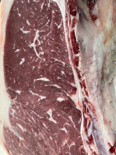 a close up of a piece of meat on a plate at Albergo La Pineta in Cingoli