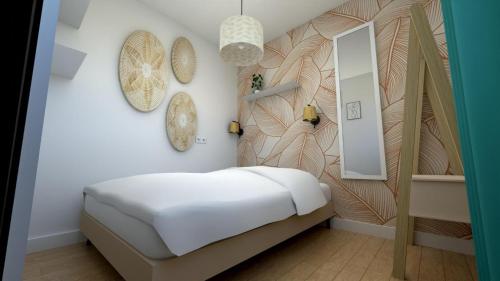 Postel nebo postele na pokoji v ubytování Cosy Plenity - T3 - Centre ville - Parking gratuit