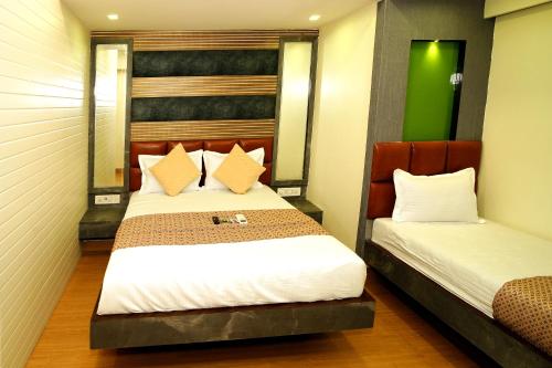 Hotel Abraj Innにあるベッド