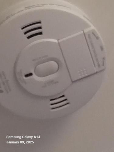a nintendo wii game controller sitting on a table at 42 Churchbury Rd, Room 3 in Eltham