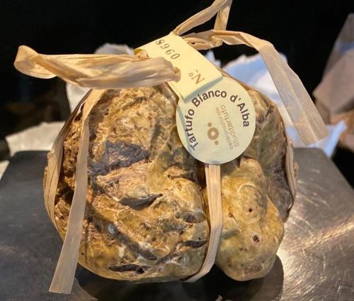 a loaf of bread with a thermometer on top of it at SUITE BOTTICELLI in Albavilla