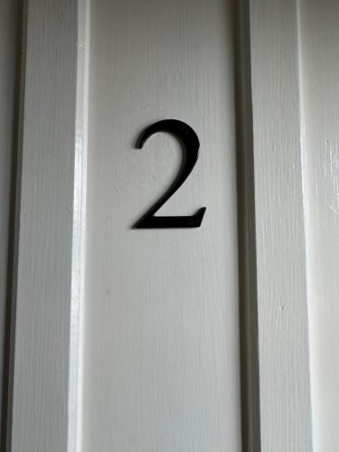 a number on a door with the number two on it at The White Horse in Faversham