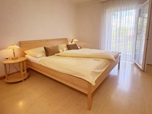 En eller flere senge i et værelse på Ferienwohnungen Sauerschnig