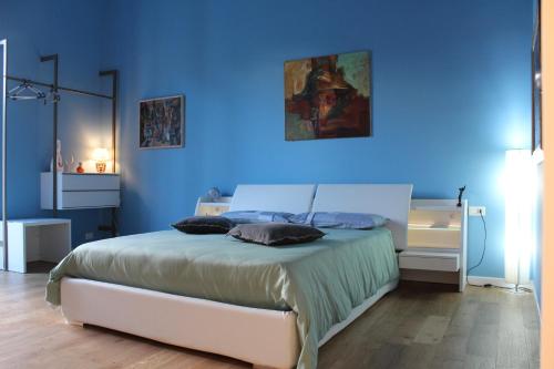 Postel nebo postele na pokoji v ubytování FALSTAFF Rooms & Suites