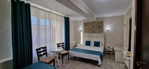 Postel nebo postele na pokoji v ubytování Florian Rooms