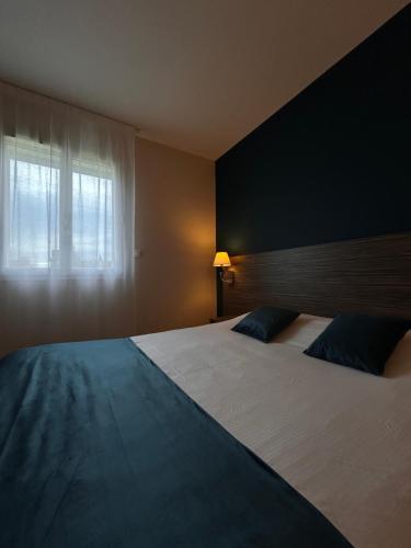 Postel nebo postele na pokoji v ubytování Hotel Caiman