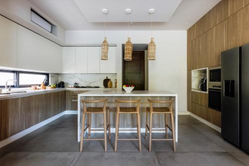 Kuchyň nebo kuchyňský kout v ubytování Luxury Modern Villa Puerto Aventuras - Rivera Maya