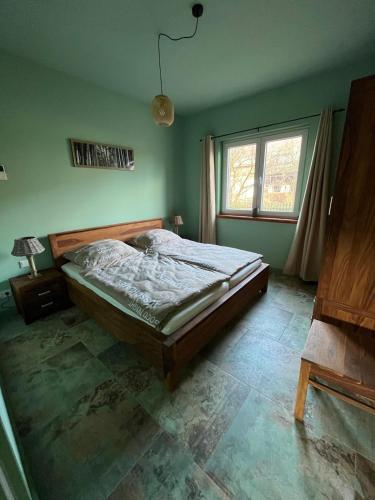 Postel nebo postele na pokoji v ubytování Ferienwohnung 2 Km an der A9 nähe Potsdam Berlin
