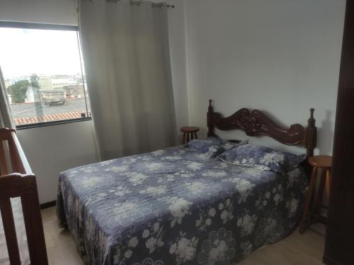 Postel nebo postele na pokoji v ubytování Excelente suíte próximo ao centro