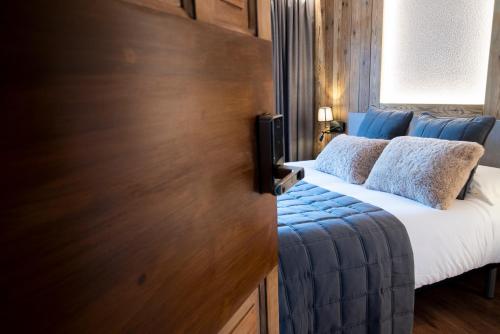 Una cama o camas en una habitación de Borda Conangle Mountain Lodge