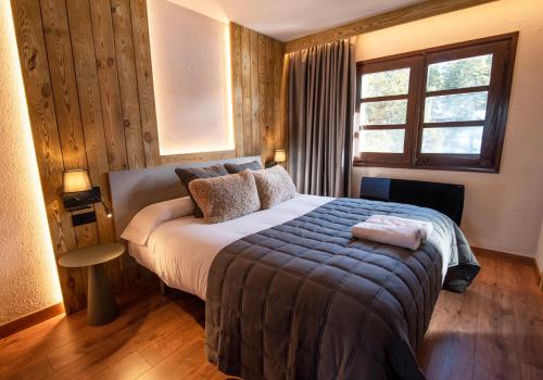Postel nebo postele na pokoji v ubytování Borda Conangle Mountain Lodge